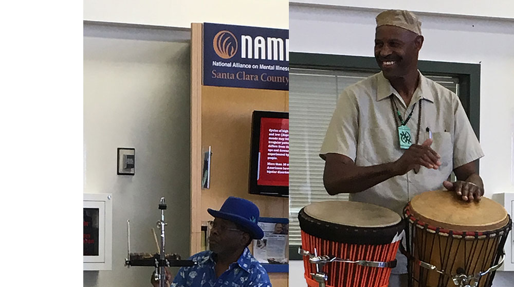 Two African Drummers Drumming