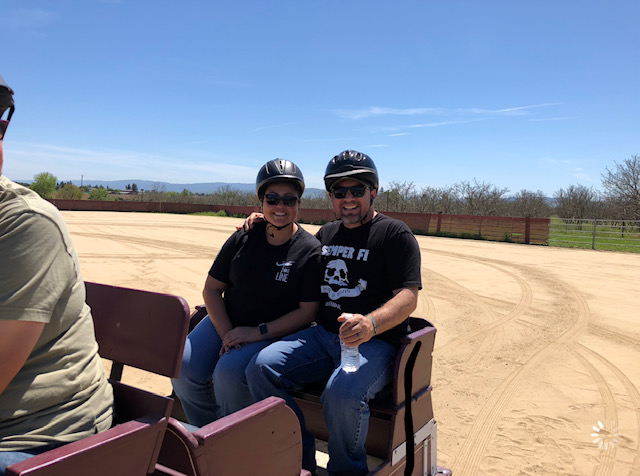 Ray and Elaine on horse-drawn carriage at Dream Power Horsemanship Program