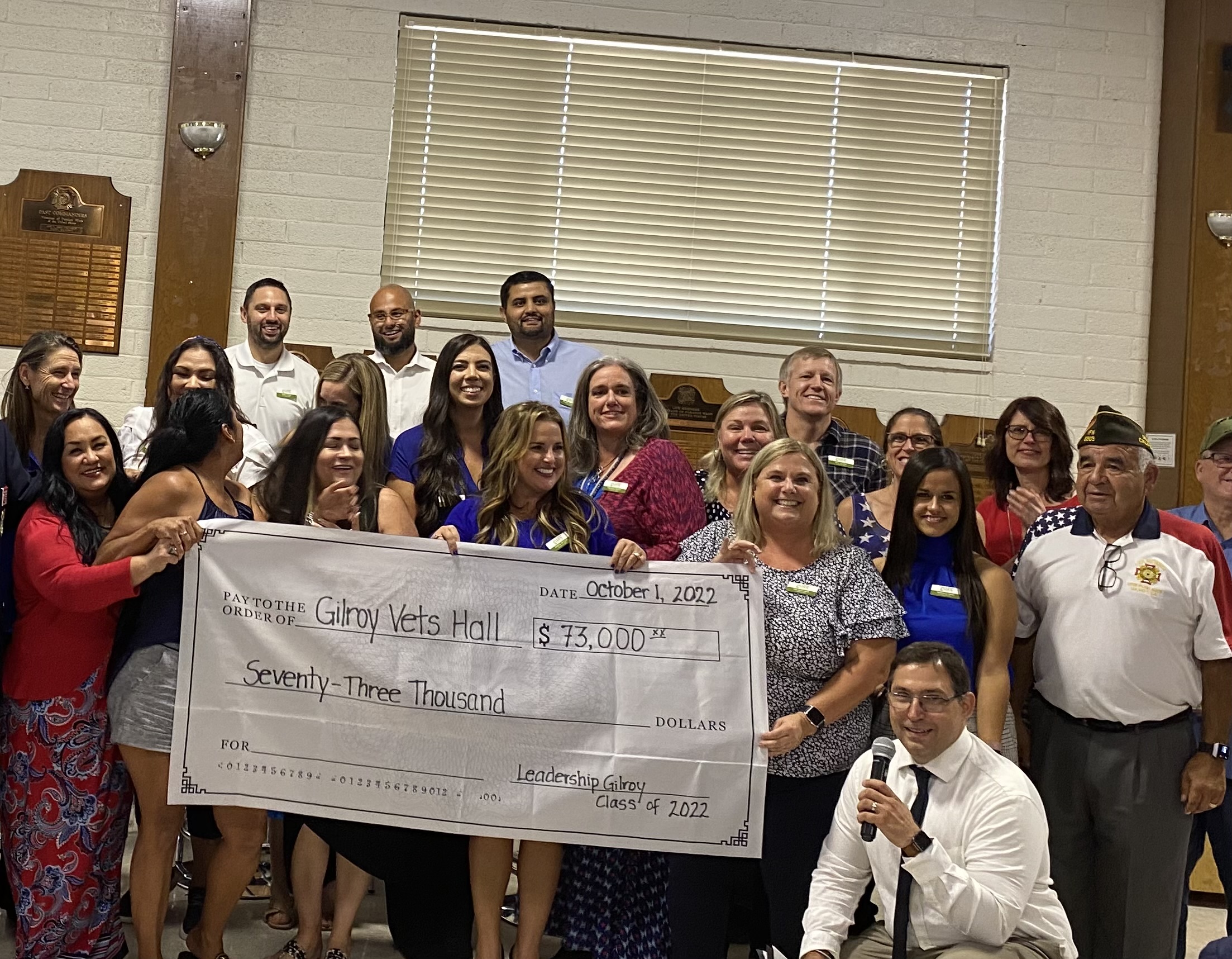 Leadership Gilroy Class holding huge check