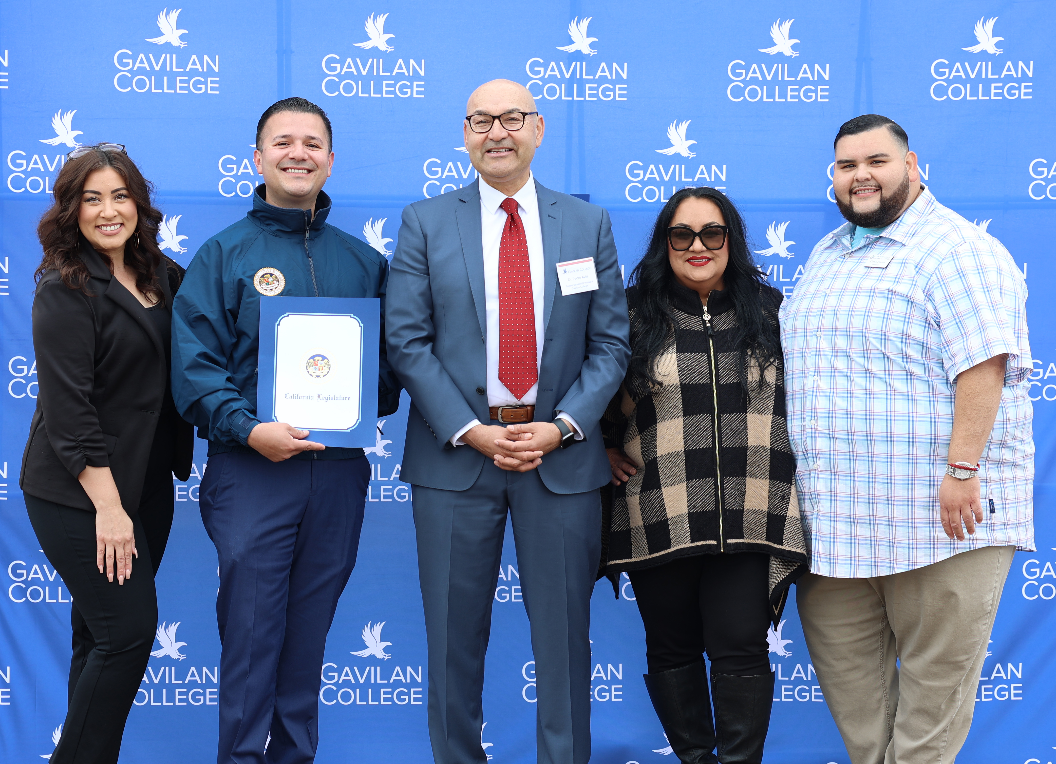 San Benito County Chamber members with Dr. Pedro Avila and Andres Rodriguez presenting a certificate on behalf of Robert Rivas. 