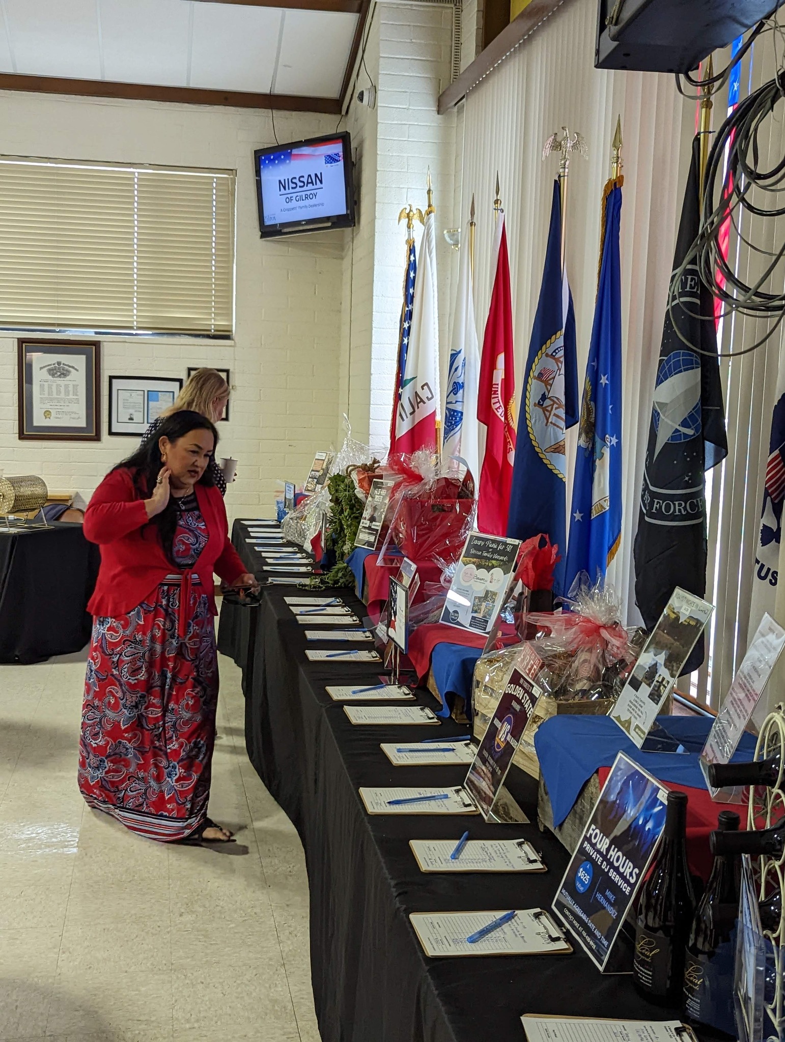 Silent Auction for Leadership Gilroy's Veterans event.  Tables lined up with items.